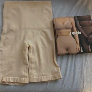 Skims mid thigh NWT in box never worn